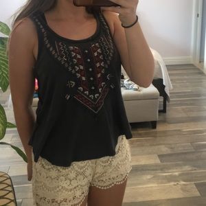 Really cute top with a boho design